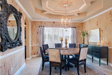 Inspiration for a mid-sized transitional porcelain tile enclosed dining room remodel in Houston with beige walls