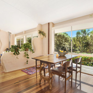 This is an example of a mediterranean dining room in Other.