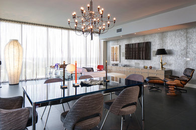 Photo of a contemporary open plan dining room in Orlando with grey walls.