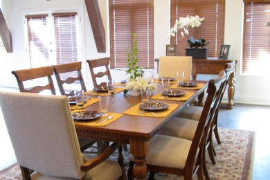 Dining room - large transitional brown floor dining room idea in San Diego with beige walls and no fireplace