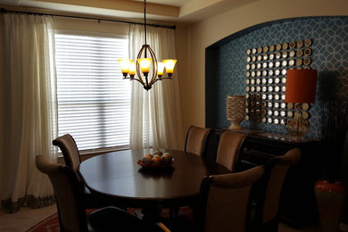 Example of an eclectic dining room design in Dallas