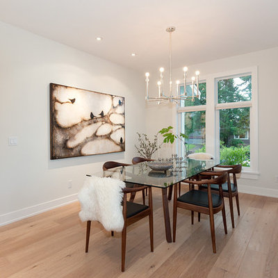 Inspiration for a contemporary dining room remodel in Vancouver with white walls