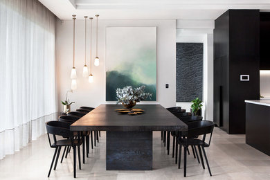 Idee per una sala da pranzo aperta verso il soggiorno minimalista con pareti grigie e pavimento grigio