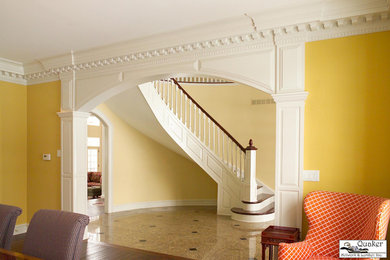 Inspiration for a timeless dining room remodel in New York with yellow walls