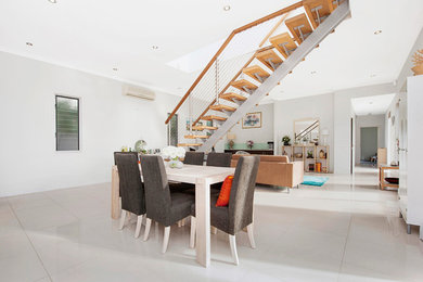 Photo of a modern dining room in Gold Coast - Tweed.