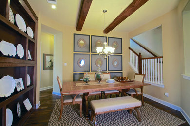 Mid-sized elegant dark wood floor dining room photo in Austin with beige walls