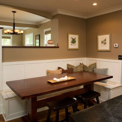 Elegant dark wood floor kitchen/dining room combo photo in Minneapolis with brown walls