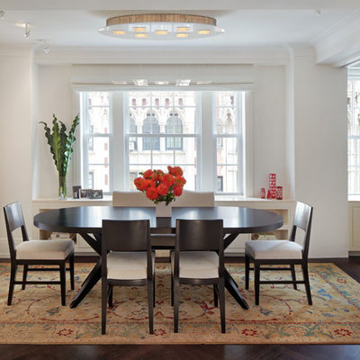 Enclosed dining room - mid-sized transitional dark wood floor enclosed dining room idea in New York with white walls and no fireplace