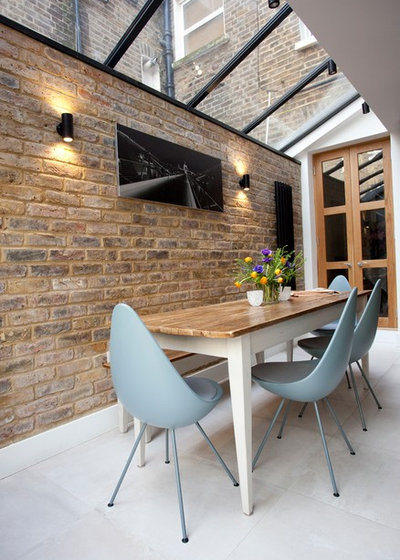 Contemporary Dining Room by Landor Design