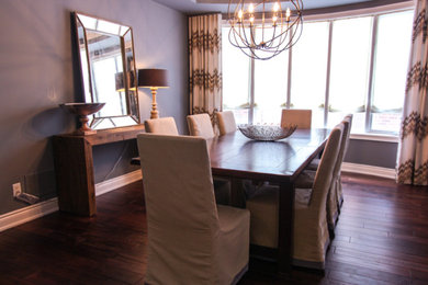 Transitional dining room photo in Toronto