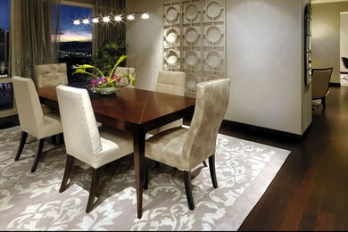 Example of a small asian dark wood floor dining room design in Las Vegas