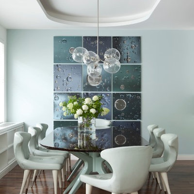 Trendy dark wood floor dining room photo in New York with blue walls and no fireplace