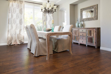 Inspiration for a medium sized traditional kitchen/dining room in San Diego with grey walls and medium hardwood flooring.