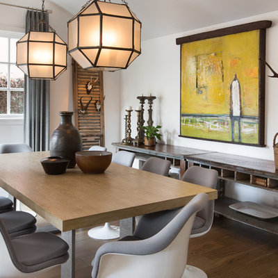 Large transitional medium tone wood floor and brown floor enclosed dining room photo in Orange County with white walls and no fireplace