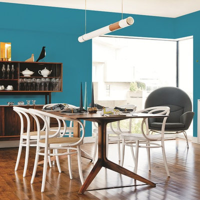 Dining room - contemporary dining room idea in Other with blue walls
