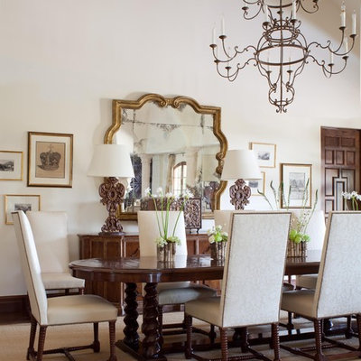 Inspiration for a mediterranean dining room remodel in Denver with white walls