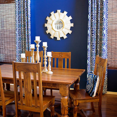 Inspiration for a mediterranean dining room remodel in Phoenix with blue walls