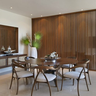 Dining room - contemporary dining room idea in Miami with white walls