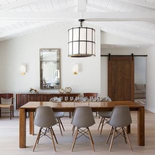 Large mid-century modern light wood floor and beige floor enclosed dining room photo in San Francisco with white walls and no fireplace