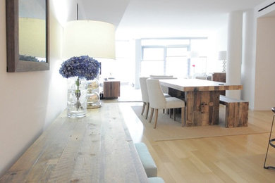 Great room - small transitional light wood floor great room idea in New York with white walls