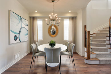 Example of a transitional dining room design in Ottawa
