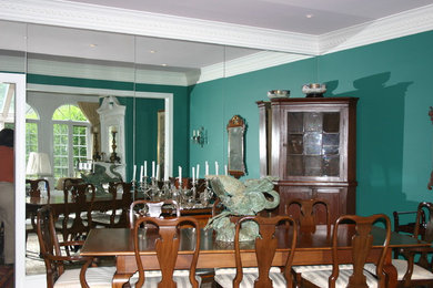 Example of a small dining room design in Philadelphia with blue walls