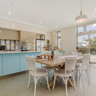 This is an example of a beach style dining room in Perth.