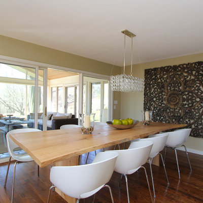 Dining room - contemporary dark wood floor dining room idea in New York with beige walls