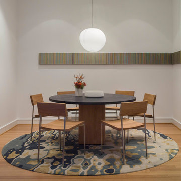 White Modern Loft Dining Room with Round Table, Round Pendant Light