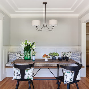 Inspiration for a mid-sized craftsman medium tone wood floor and brown floor kitchen/dining room combo remodel in San Francisco with gray walls and no fireplace