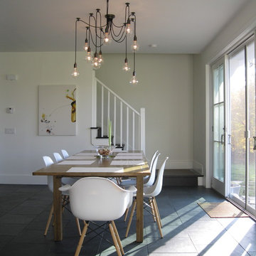 Modern dining area with Edison bulb chandelier
