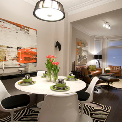 Minimalist dark wood floor dining room photo in Toronto with beige walls