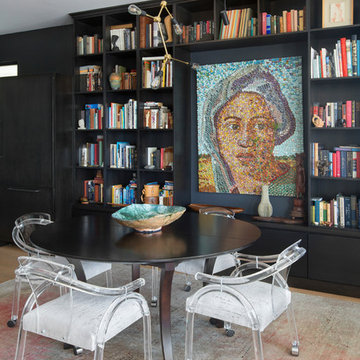 Modern Dining Room with Black Built-In Bookshelves