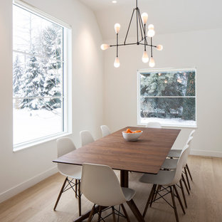 Danish light wood floor dining room photo in Salt Lake City with white walls