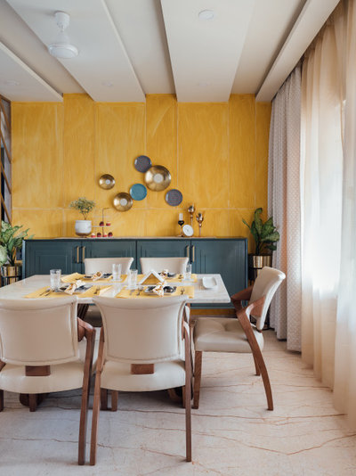Contemporary Dining Room by The Artisanal Story