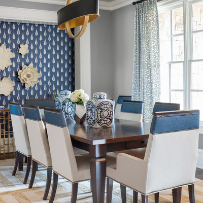 Enclosed dining room - large transitional medium tone wood floor enclosed dining room idea in Atlanta with multicolored walls and no fireplace