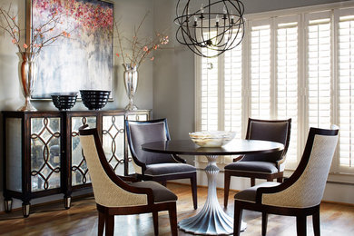 Mid-sized trendy medium tone wood floor kitchen/dining room combo photo in Atlanta with gray walls