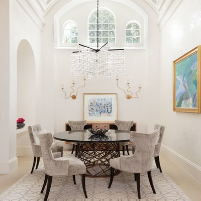 Enclosed dining room - large transitional light wood floor enclosed dining room idea in Miami with white walls and no fireplace