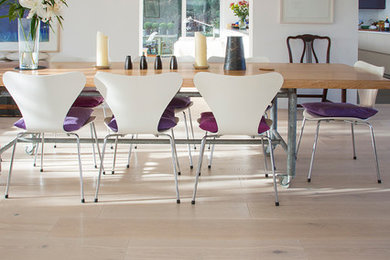 This is an example of a contemporary dining room in Cheshire.