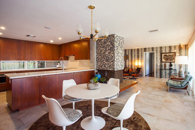 Kitchen/dining room combo - large mid-century modern ceramic tile kitchen/dining room combo idea in Los Angeles with white walls and no fireplace