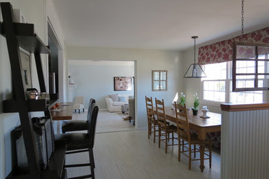 Mid-sized transitional painted wood floor dining room photo in Boston with gray walls