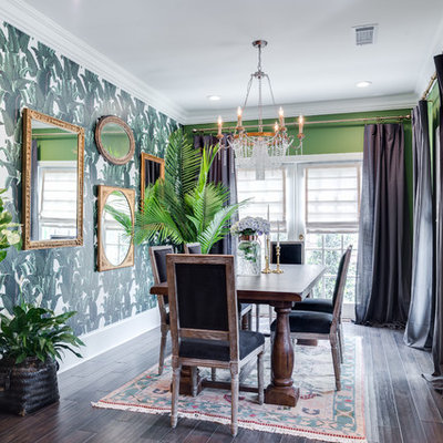 Example of a small eclectic dark wood floor and brown floor enclosed dining room design in Orange County with green walls and no fireplace