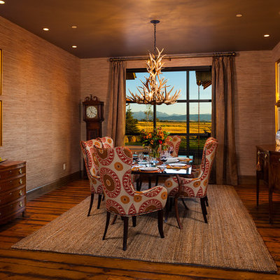 Example of a trendy dark wood floor dining room design in Other