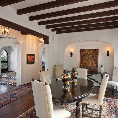 Tuscan dining room photo in Santa Barbara with white walls