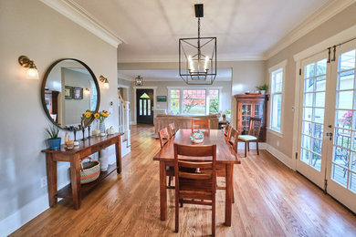 Example of an arts and crafts dining room design in Seattle