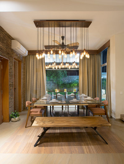 Contemporary Dining Room by The BNK Group