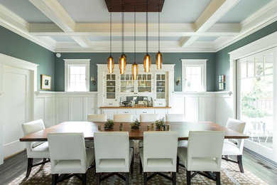 Traditional enclosed dining room in Portland with feature lighting.