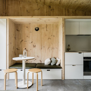Photo of a scandinavian dining room in Sydney.