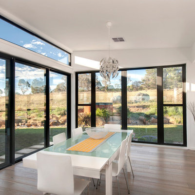Inspiration for a large contemporary light wood floor kitchen/dining room combo remodel in Canberra - Queanbeyan with white walls