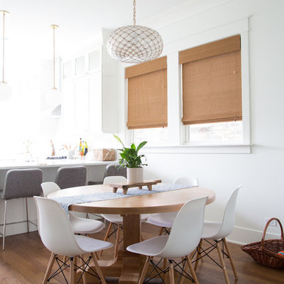 Beach style medium tone wood floor kitchen/dining room combo photo in Chicago with white walls and no fireplace